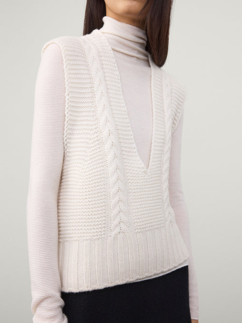 White ribbed knit vest cashmere Lisa yang worn by a person on a plain background